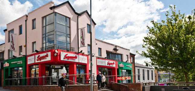 Storefront image of Supermac’s Navan restaurant featuring Supermac’s and Papa John’s signage